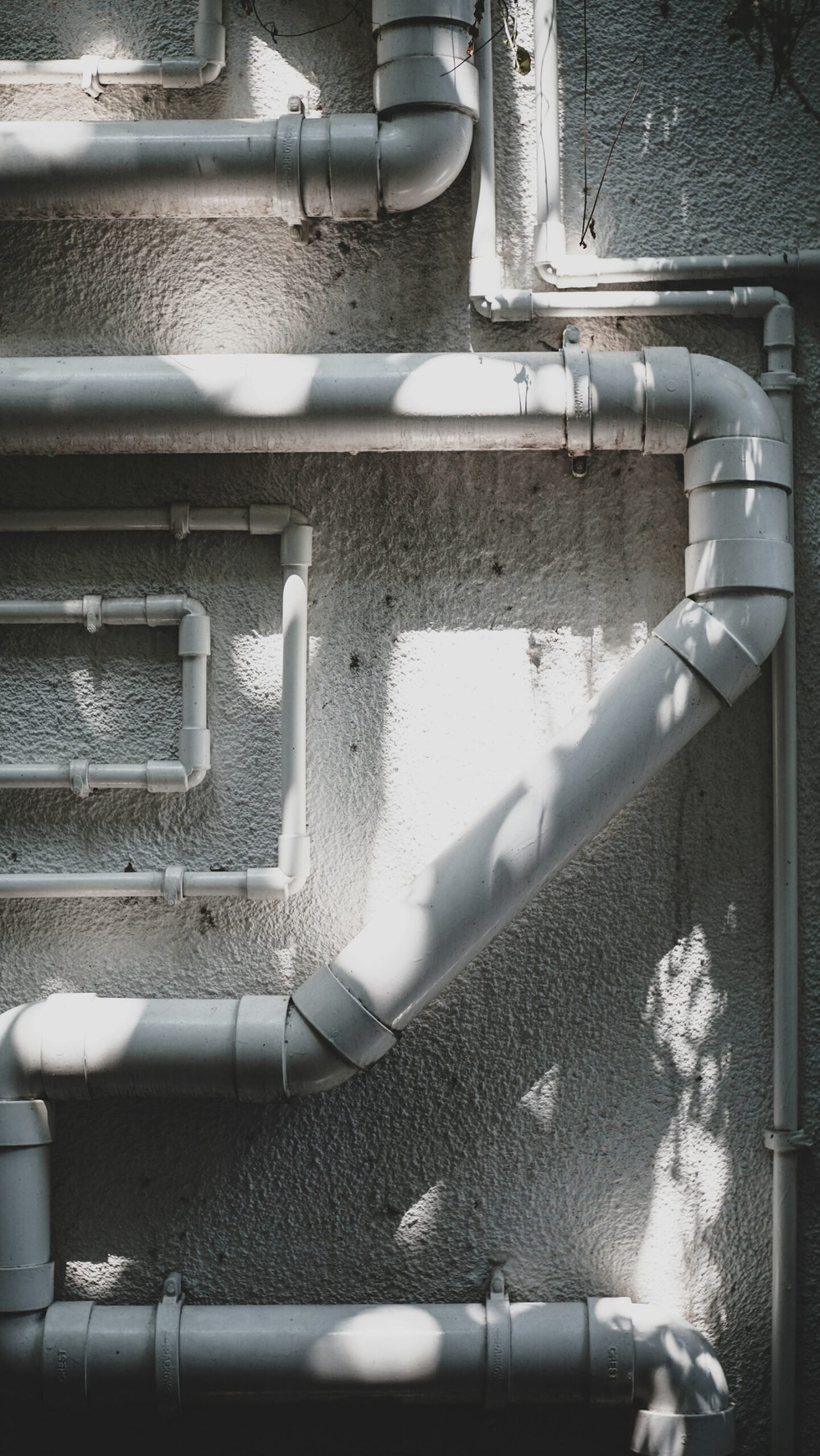 PEX plumbing pipe repipe running through a residential attic