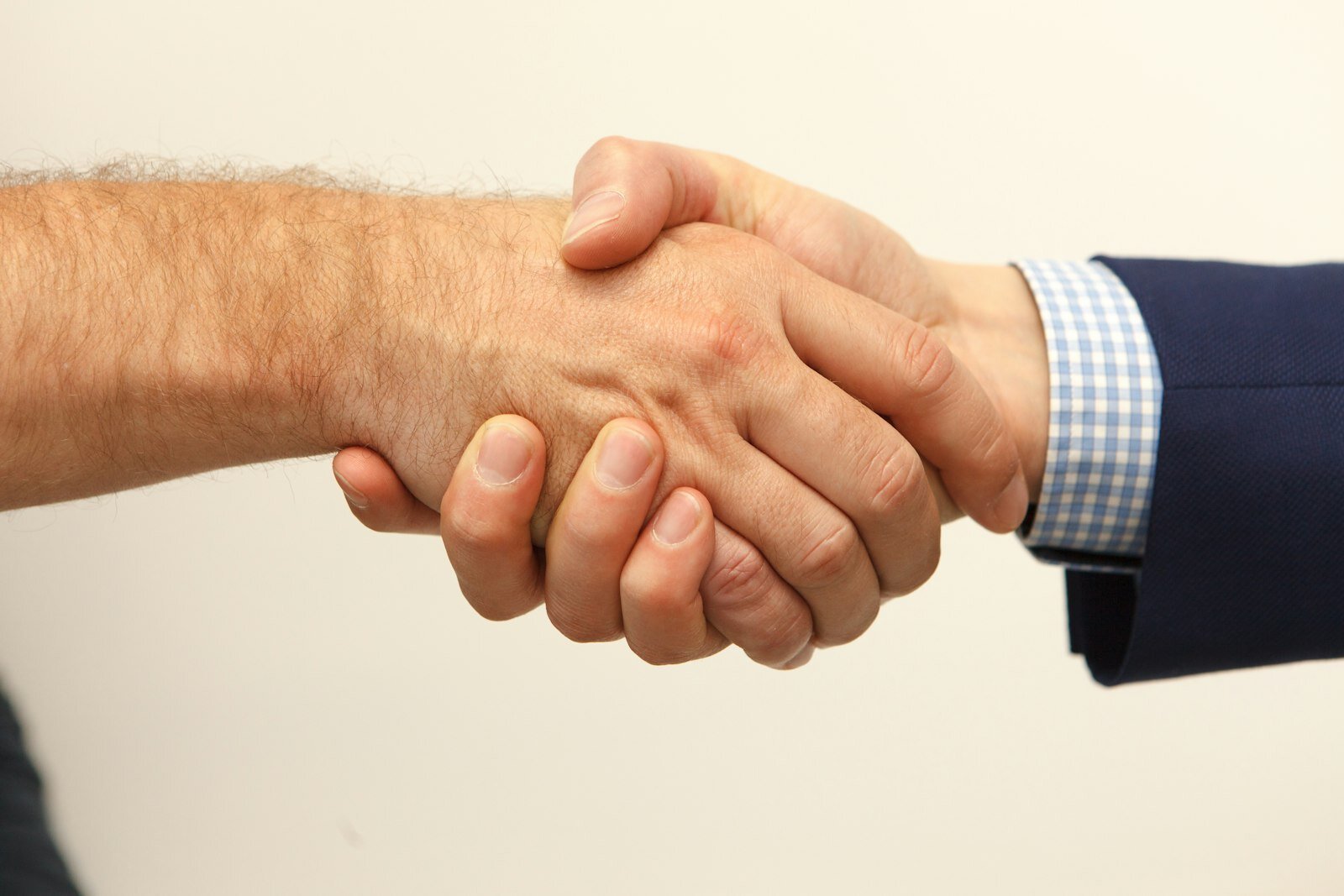 Handshake between a homeowner and a restoration company representative
